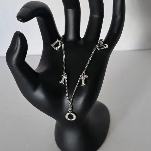CHRISTIAN DIOR Women's Rhinestone Charm Adjustable Chain Silver Metal Bracelet - Picture 1 of 5